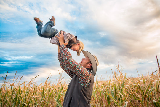 Maze_Norton_Dad Son_swing high laughing.jpg
