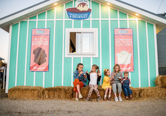 Brownie Stack_Kids_Eating Sitting on hay 1_RJ.jpg