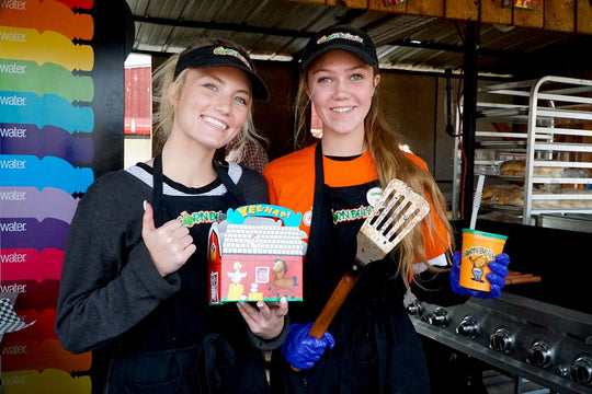 Employee_Grill Shack_Smiling with kids meal.jpeg