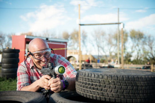 Paintball_dad_goggles hiding shooting.jpg