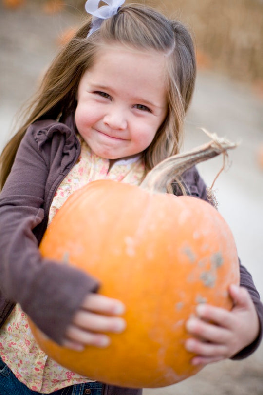 Pumpkin_Girl_Carrying smiling Ashlyn.jpg