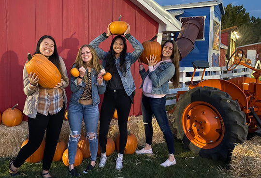 Pumpkin_Teen Girls_Pick Purchase Smiling Carrying.jpeg
