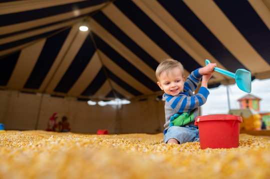 Corn Cob Beach_Boy playing pail shovel 2_RJ.jpg