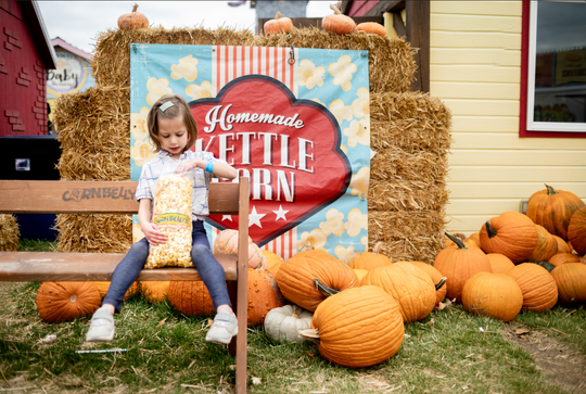 Kettle Corn_Girl_on bench eating 1_RJ.jpg